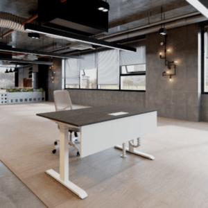 Modern Height Adjustable Desk with a dark top and white base, paired with a light gray office chair, set in an industrial-style office with concrete walls and large windows.