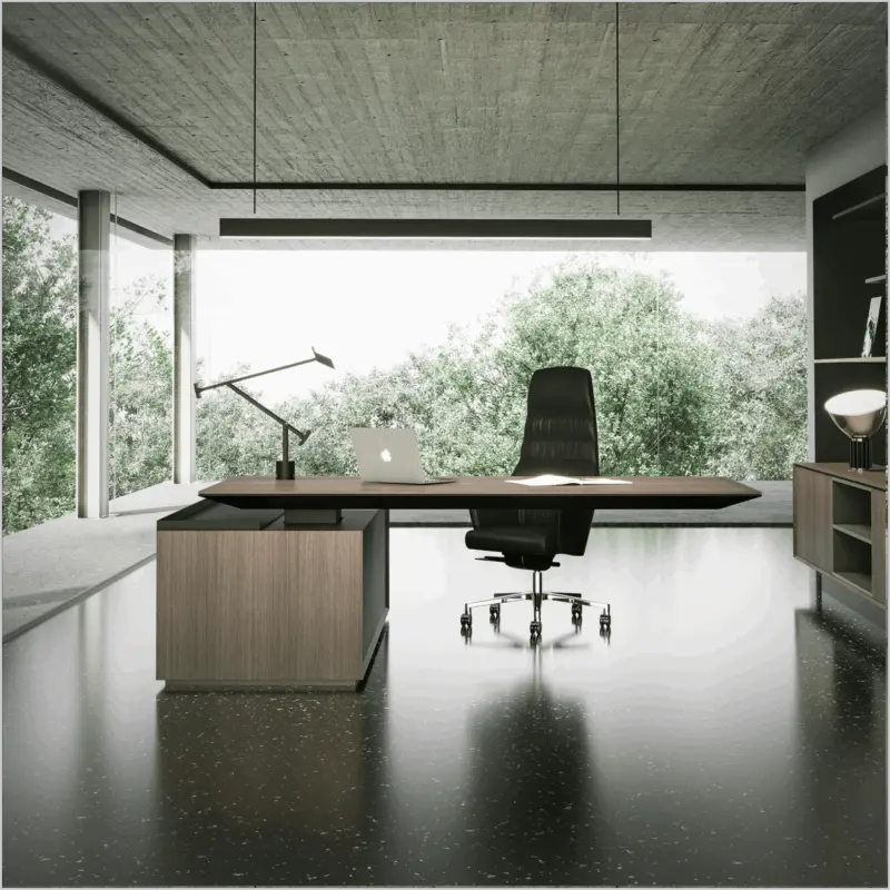 Luxurious modern executive office furniture setup featuring a sleek dark wood desk with an integrated low credenza and a high-back black leather ergonomic chair. The room has a concrete ceiling and highly polished dark floor, with expansive curved windows offering views of lush greenery.
