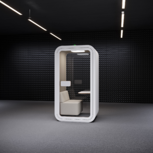 A white Urban 411 Smart One lounge office pod featuring a comfortable cream-colored single sofa seat, integrated work desk, and internal lighting for private focus sessions.